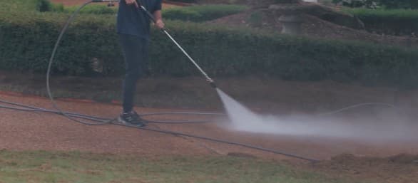 Knox Exterior Care Company crew pressure washing at a Knoxville property