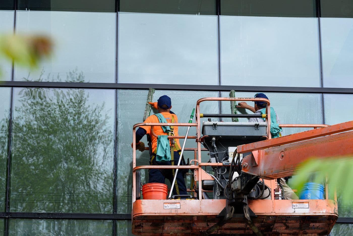 Commercial window cleaning from a boom lift